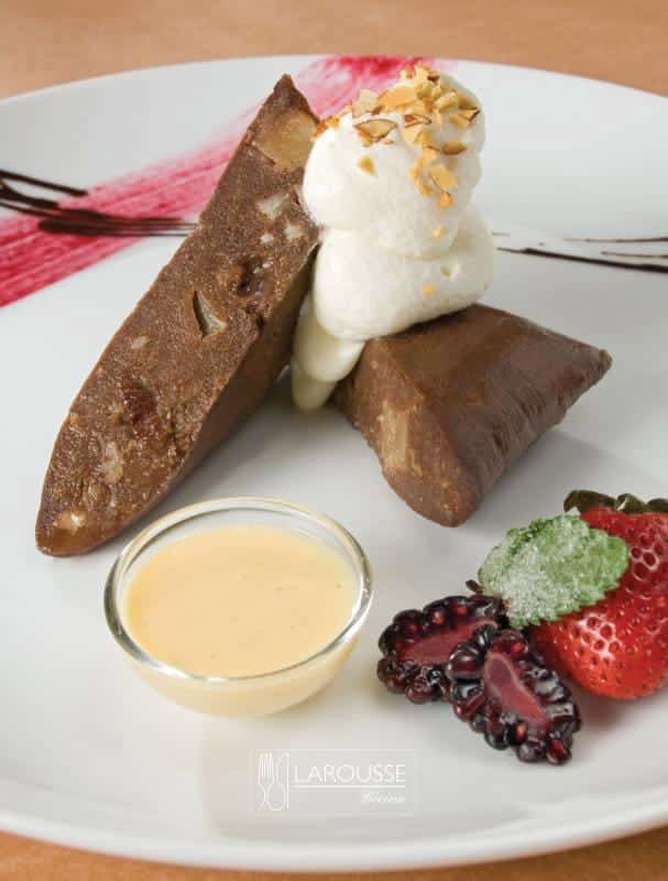 Busca en nuestra sección de recetas estos tamales de chocolate con piña piña y nuez. Fuente: Archivo fotográfico de Larousse Cocina.